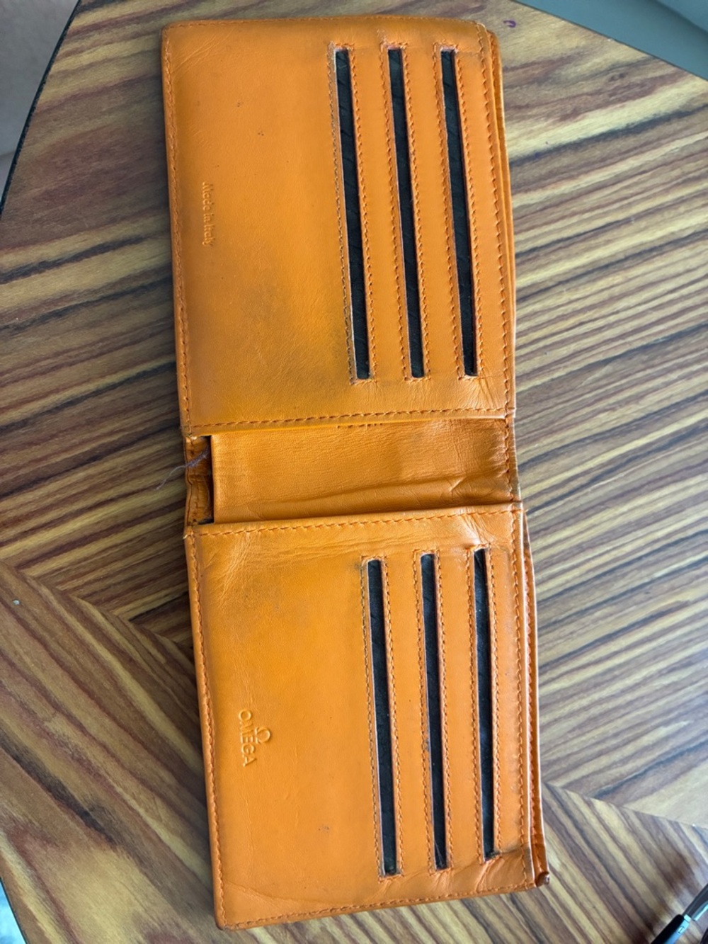 Omega Men’s Orange leather wallet